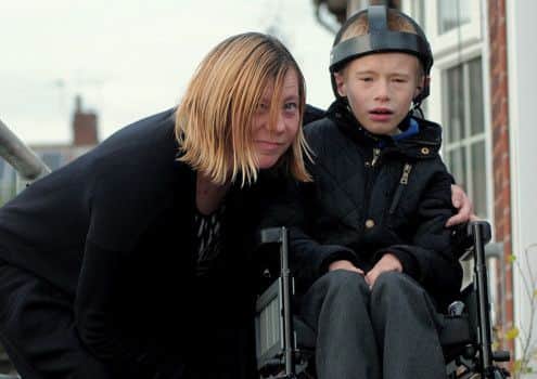 Sharon Parsons & her son James (10) of Worksop.
Sharon is unhappy that her disabled & Wheelchair bound son James, was
not allowed on to a local Bus.