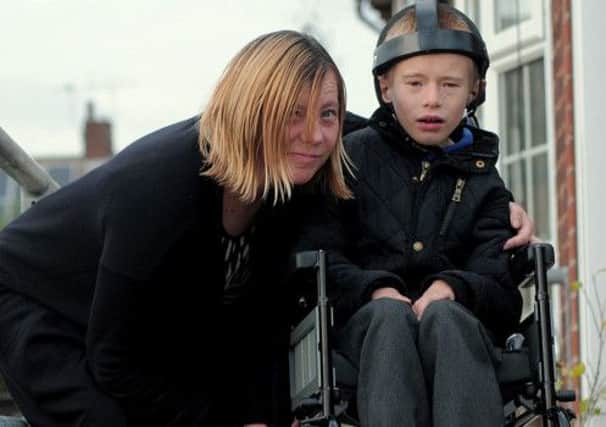 Sharon Parsons & her son James (10) of Worksop.
Sharon is unhappy that her disabled & Wheelchair bound son James, was
not allowed on to a local Bus.