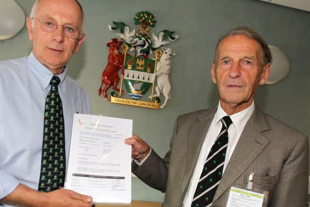 Gordon Allen presented a petition to Coun Jeff Summers, leader of West Lindsey District Council protesting about the urbanisation of Saxilby and surrounding areas.