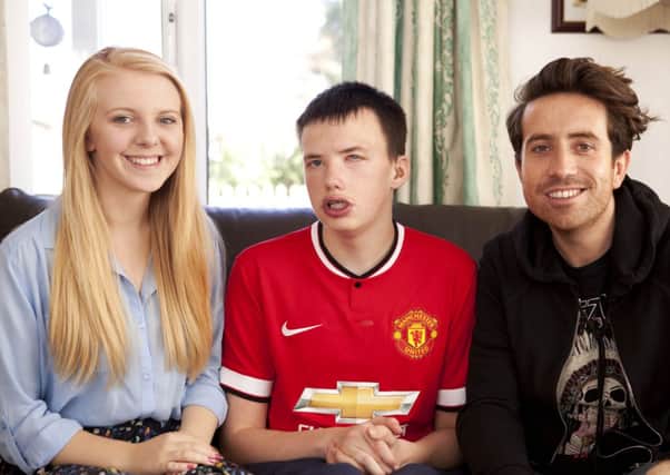 Jack Marshall pictured with Radio 1 Breakfast show host Nick Grimshaw and Grace, who nominated him for the award.
