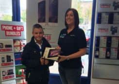 Winner of the mobile phone design competition, Reece George, from St George's primary school in Gainsborough.