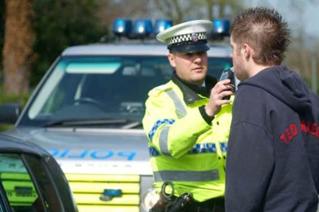 breathalyser test / breath test / drink and drive / police / alcohol / road safety / anti drink driving