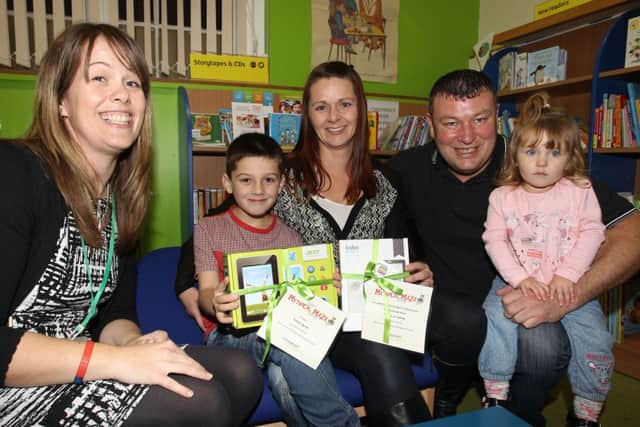 Finley Ingram has won the summer reading challenge at Gainsborough library. He is pictured with Tarina Jones from the library and mum Sandra, dad Alan and sister Iyla.