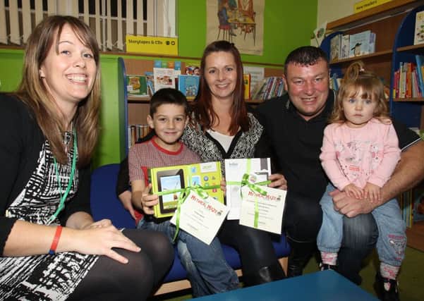 Finley Ingram has won the summer reading challenge at Gainsborough library. He is pictured with Tarina Jones from the library and mum Sandra, dad Alan and sister Iyla.