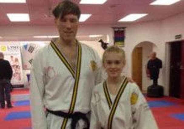 Millie Morgan has just achieved her Second Dan Black Belt under Lynx Academy instructor Andrew Blinston