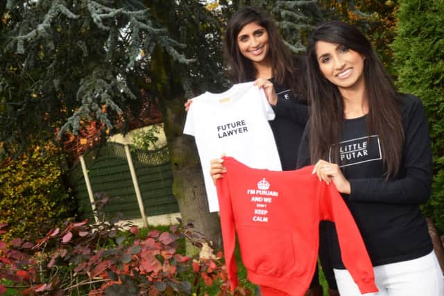 Sisters Rajveen Takhar, 26 and Harleen, 29, of Westwoodside, have set-up Little Putar babywear a quirky Punjabi clothing collection which features funny Punjabi slogans, phrases and surnames. Picture: Marie Caley D5728MC