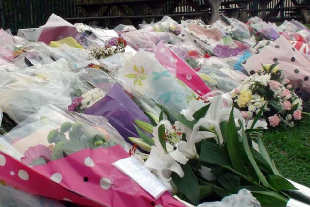 Floral tributes outside Danum Academy in Doncaster for the five teenagers who died in a two-car collision on Saturday.