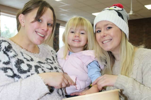 Christmas bazaar Community Hall, Woodland Avenue, Crowle L>R Carrie Temperton, Lacey Mills age 3, Becki Temperton
