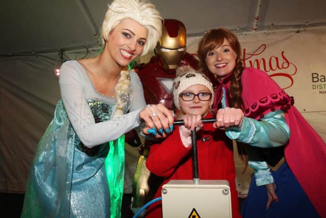 Worksop Christmas lights switch-on 2014. Ellie Mai switced the lights on with the help from Frozen characters Elsa and Anna and Iron Man.
