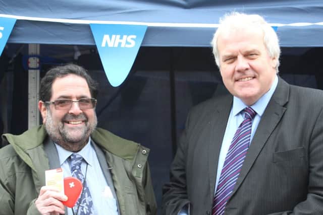 Co-ordinating Member for Health and Community Safety Cllr Alan Caine and Richard Childs, lay chair of the NHS Lincolnshire West Clinical Commissioning Group after their health checks in Marshalls Yard.