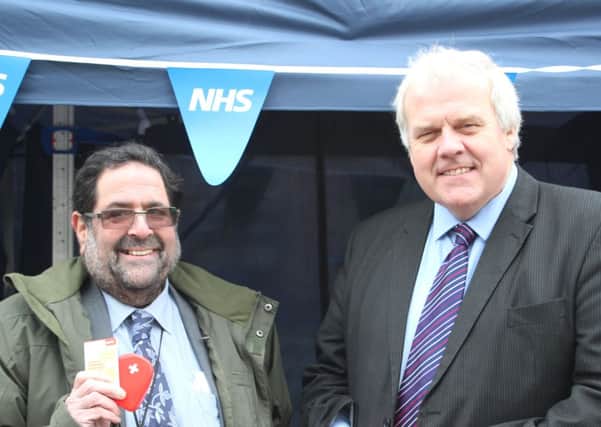 Co-ordinating Member for Health and Community Safety Cllr Alan Caine and Richard Childs, lay chair of the NHS Lincolnshire West Clinical Commissioning Group after their health checks in Marshalls Yard.