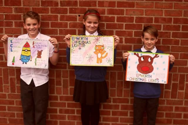 Epworth County Primary poster winners - 1. Hannah Maxfield, 11 yrs (centre); 2. Oliver Hall, 10 yrs (left); 3r. Jamie Huntington, 11 yrs (right).
