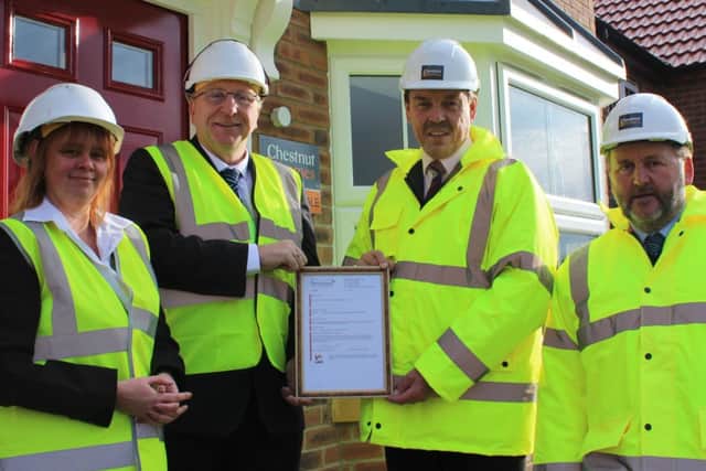 Jodi Wray and Trevor Durant from West Lindsey District Council with Chestnut Homes Rob Cucksey and Mick Burridge