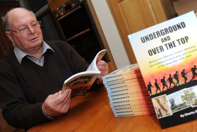 Worksop author Charles Emsen with copies of his new book, Underground and Over the Top