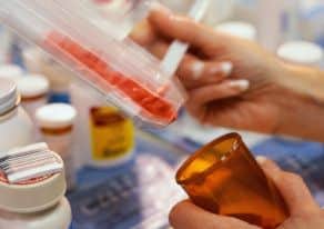 Pharmacist dispensing drugs.