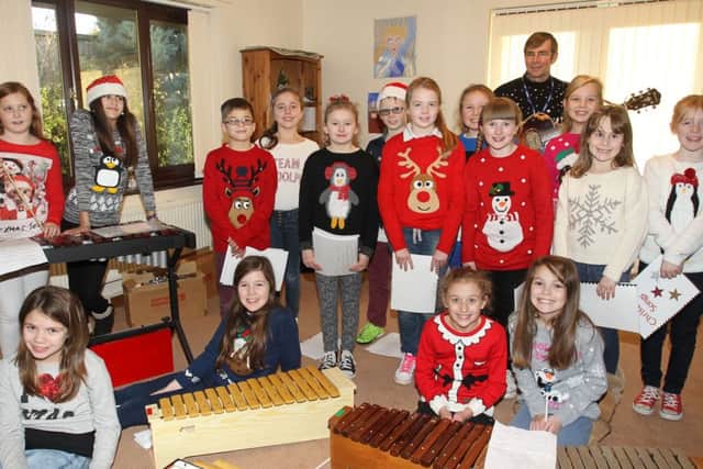 The school choir from Morton Trentside Primary sang Christmas songs at George Henderson Lodge St Barnabas Hospice in Morton.
