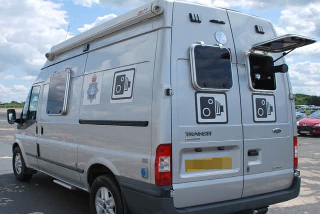 A mobile speed camera van.