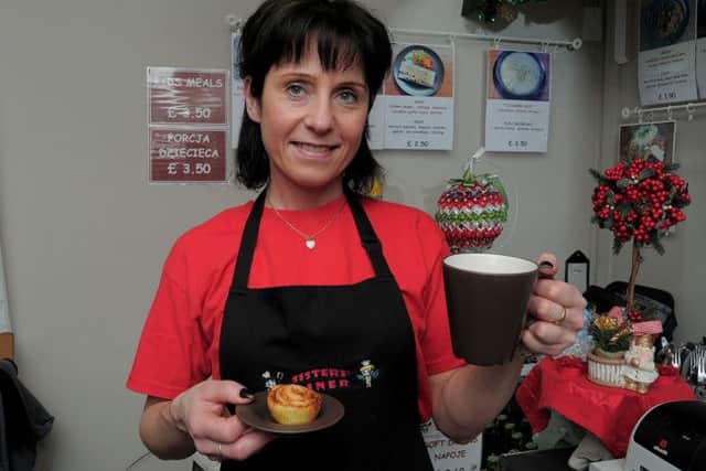 Sisters Diner owner Maggie Kopanska with the Danish Pastry & Tea or Coffee, available free this week.
Sisters Diner is at 52 Gateford road, Worksop.
NWGU 15-12-14 Danish, Sisters Diner owner Maggie Kopanska, pictured with the Free Danish pastry & Tea or coffee ( 1 & 2).