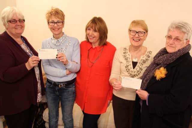 Crowle cheque presentation - (pictured from left) Christine Wharton (stroke prevention and support adviser at Scunthorpe Hospital), Paula Buttrick, Lynn Whalley, Val Janssen and Louise Wright (Isle of Axholme support group for Lindsey Lodge Hospice).