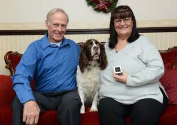 Allan Bell with springer spaniel Rosie and wife Pat and the diamond