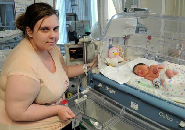 Lauren with her baby Holly