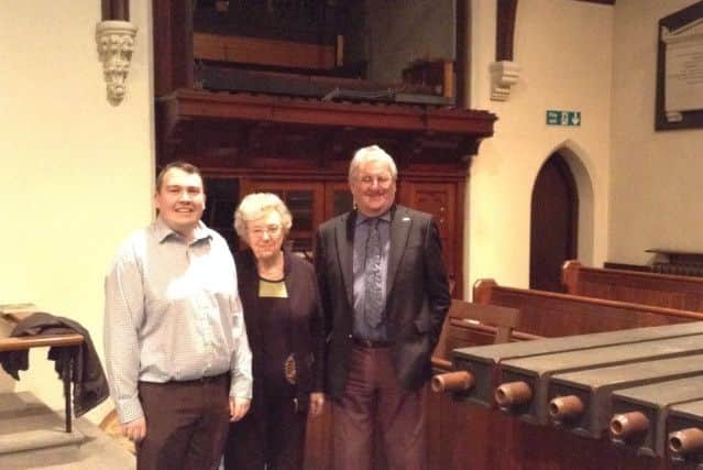 Organists of the church and the organ, pictured (from left) Daniel Fields, Rachel Bollons and Michael Bradbury.