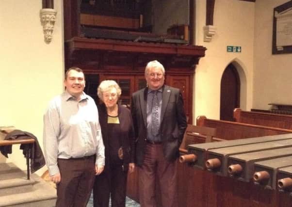Organists of the church and the organ, pictured (from left) Daniel Fields, Rachel Bollons and Michael Bradbury.