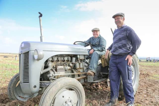 Pictured at last year's Festival of The Plough are Billy Nicholson, 14, and Steve Balnshard from Misterton.