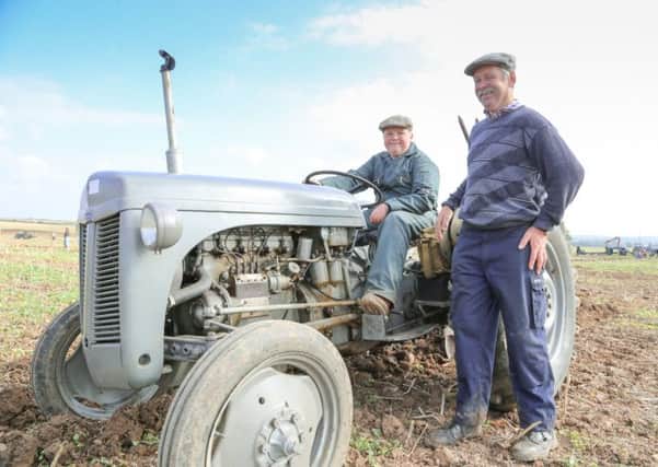 Pictured at last year's Festival of The Plough are Billy Nicholson, 14, and Steve Balnshard from Misterton.