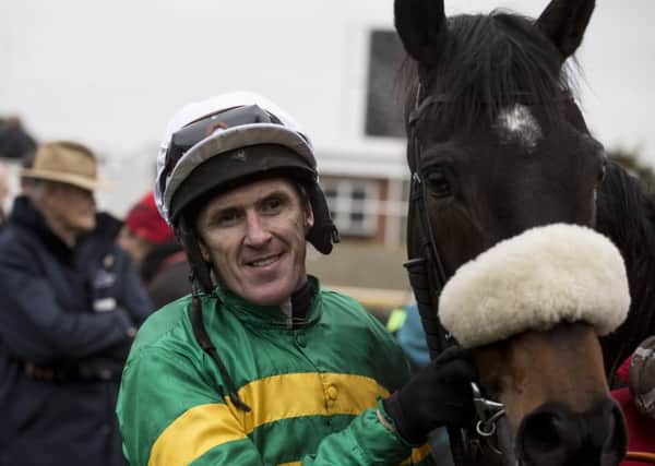 THE REAL MCCOY -- Tony McCoy with Mr Mole after his 200th winner of the season, and just before he announced his retirerment at Newbury last Saturday. (PHOTO BY: Julian Herbert/PA Wire).