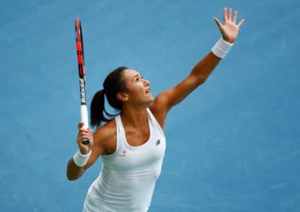 BUDAPEST, HUNGARY - FEBRUARY 06: Heather Watson of Great Britain in action against Elina Svitolina of Ukraine during day three of the Fed Cup/Africa Group One tennis at Syma Event and Congress Centre on February 6, 2015 in Budapest, Hungary. (Photo by Julian Finney/Getty Images for LTA)