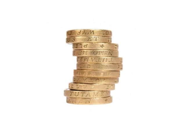 A stack of pound coins.