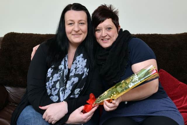 Guardian Rose for Lisa Hellewell for being a great friend, Lisa is pictured right recieving her rose from Melanie Heslop