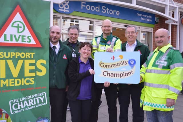 LIVES First Responders Gary Bolton and Andy Kerry, Lincolnshire Co-ops Hayley Baggott, LIVES First Responder Carl Belcher, LIVES Fundraising Manager Stephen Hyde and LIVES Medic Tony Tempest.