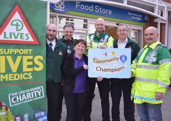 LIVES First Responders Gary Bolton and Andy Kerry, Lincolnshire Co-ops Hayley Baggott, LIVES First Responder Carl Belcher, LIVES Fundraising Manager Stephen Hyde and LIVES Medic Tony Tempest.