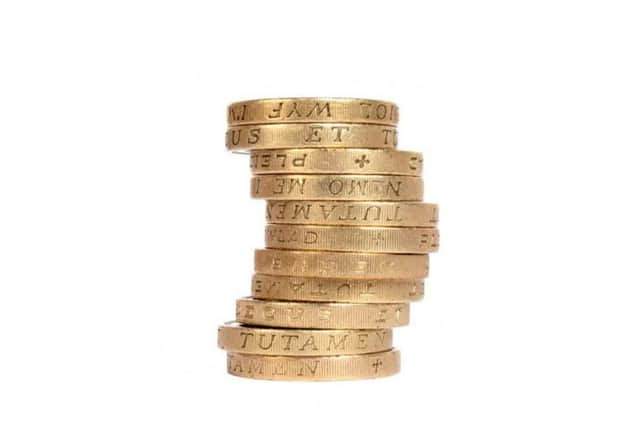 A stack of pound coins.