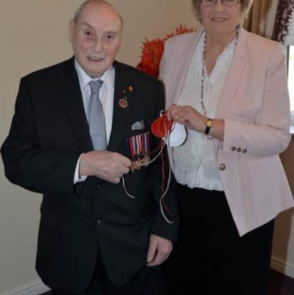 Friends of Waterside Grange Care Home came to give a talk about their experience of recieving Maundy Money from the Queen, pictured areTom Staniforth and Jenny Holland