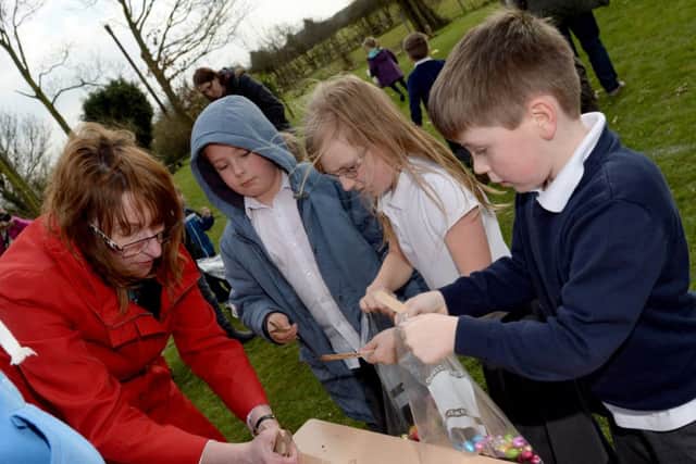 Wroot Travis Primary School Easter Egg Hunt where children had to search for coloured sticks in exchange for chocolate eggs