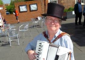 Crowle Market. Accordionist Hugh Barwell from London entertains the shoppers. Picture: Malcolm Billingham