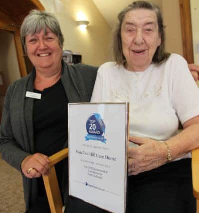 Gateford Hill Care Home in Worksop has just received an award for being in the top 20 best care homes in the East Midlands. Pictured are Home Manager Helen Hopkinson, and resident Mary Elmer.