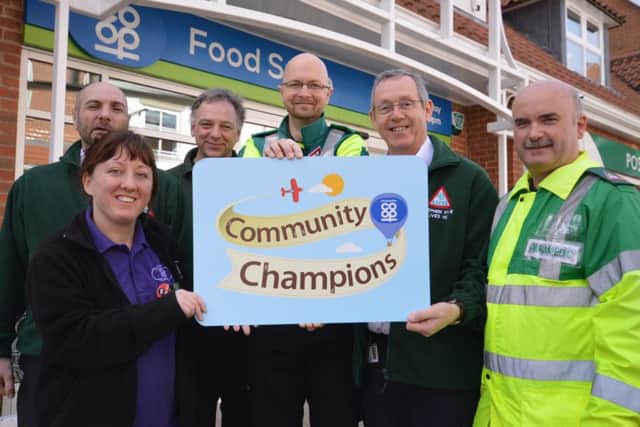 LIVES First Responder Gary Bolton, Lincolnshire Co-ops Hayley Baggott, LIVES First Responders Andy Kerry and Carl Belcher, LIVES Fundraising Manager Stephen Hyde and LIVES Medic Tony Tempest.