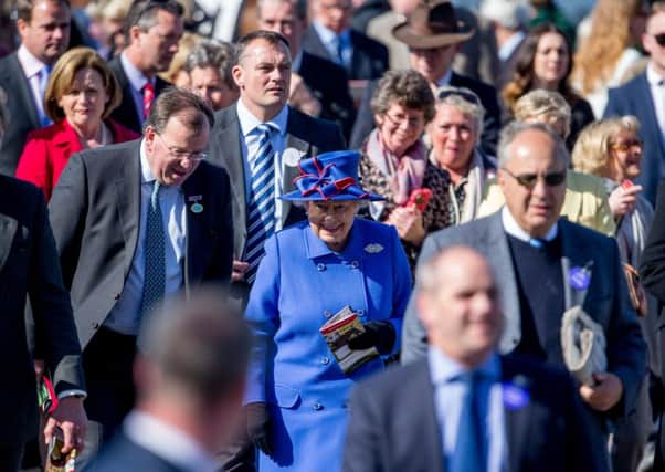 ROYAL  APPROVAL -- the Queen mixes with the crowds at Newbury's Greenham meeting. Her two-year-old filly, Ring Of Truth, is one of our early-season horses to follow. (PHOTO BY: Steve Parsons/PA Wire).