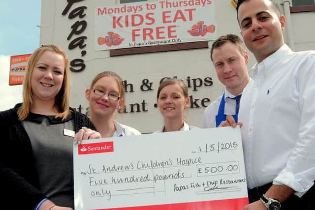 Papa's Fish & Chip Restaurant in Gainsborough, have raised £500 for
Lincolnshire's 'St Andrews Chidrens Hospice'.
The cash was raised with a Fish & Chip supper fundraiser, held in Papa's restaurant. The Hospice also looks after children from the Gainsborough area.
NGAS 1-5-15 Papa's; L/R, Lauren Alexander (Hospice Fundraiser),
Tiff Farrant (Manager), Bianca Colley, Gavin Cowan (Manager), Andrew
Papadamou (Owner). ( to 4)