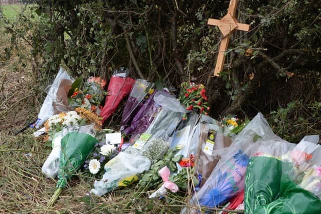 Flowers at the scene of a fatal road traffic crash on the A638 near Retford G130917-3b