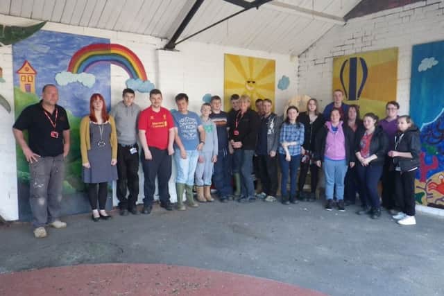 Students from North Notts College have been working at Misterton SureStart Childrens Centre on a project to brighten up their outside sheltered area of the playground