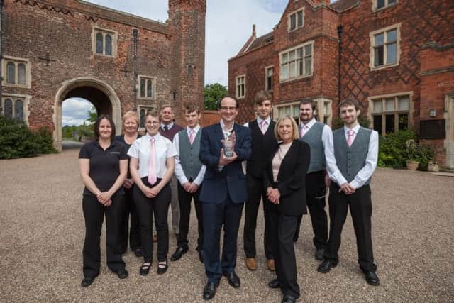 George Buchanan and members of the Hodsock Weddings Team