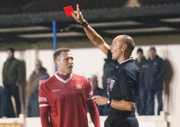 Blyth referee Chris Ward sends off FC United of Manchester's Matty Wolfenden. Ward will run the line in Football League games next season