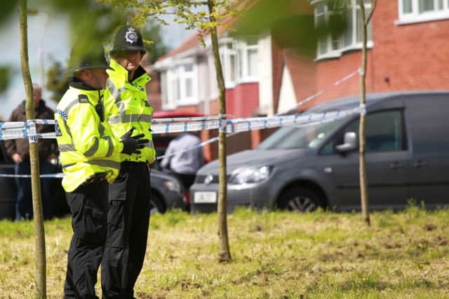 Police at the scene on Westfield Lane in Mansfield after a body was found in the search for missing Amber Peat.