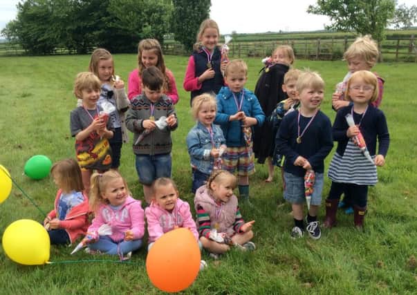Youngsters filled their wellies with jelly to help raise money to provide a service dog to assist a Gainsborough woman's son, who has autism and ADHD,