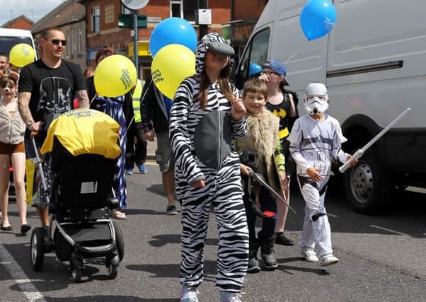 Dinnington Carnival 
Saturday 6th June 2015

The parade makes its way up Laughton Road.

Pic by Dan Westwell